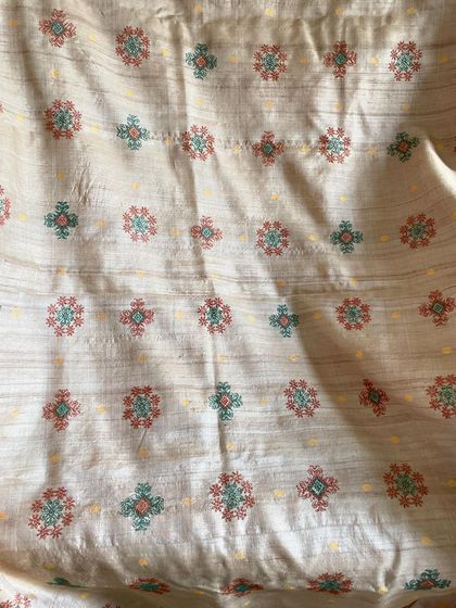 A sampler of Kasuti embroidery on a Tussar silk base. The natural texture of the silk provides a wonderful background for the counted thread stitches.