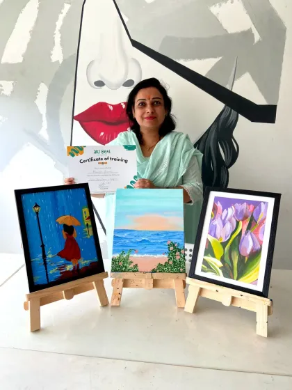 This student's acrylic paintings are full of charm, from a rainy day scene to a beautiful floral piece.