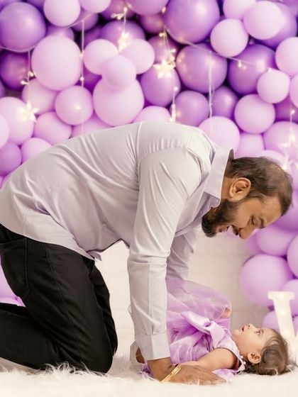 A tender moment between a father and his baby girl. These candid interactions are what make family photoshoots so special.