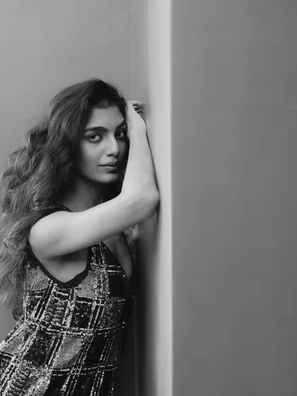 A black and white portrait from a model's test shoot. For monochrome images, I focus on sculpting the face with light and shadow to create depth and definition that translates beautifully without color.