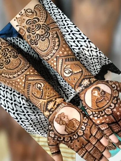 A full bridal design featuring classic Raja-Rani portraits on the palms. This is a timeless way to add a personal and royal touch to your wedding henna.