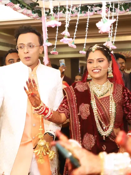 The bride's grand entrance with her groom, her happiness shining through.