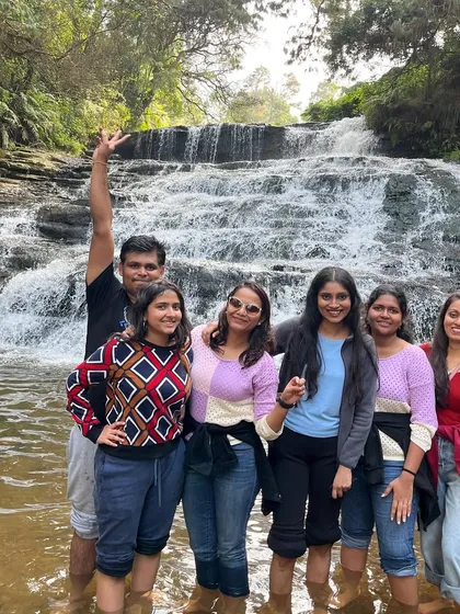 Cooling off in the Liril Falls in Kodaikanal. I always add a fun waterfall visit to the itinerary for a refreshing break.
