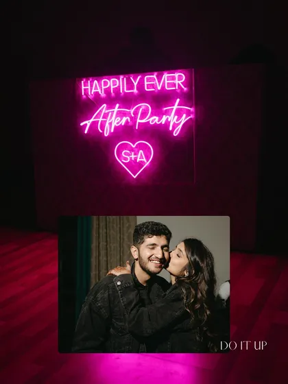 A fun and vibrant neon sign for an after-party. The sign, reading "Happily Ever After Party" with the couple's initials, creates a perfect, high-energy photo spot.