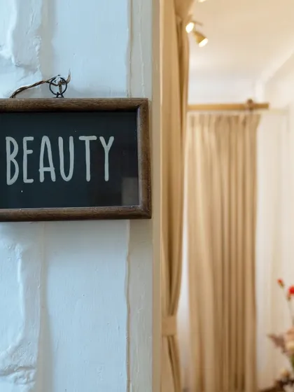 A close-up of the "Beauty" sign that marks the entrance to my treatment area. It's a simple reminder of the self-care journey you are about to begin.