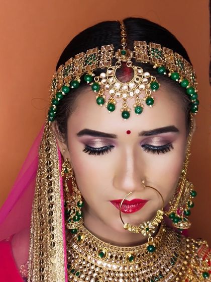 A close-up of the eye makeup, showing the soft shimmer and perfectly applied eyeliner and lashes.