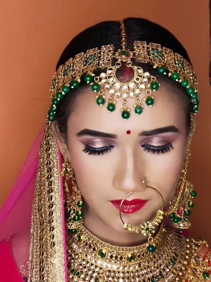 A close-up of the eye makeup, showing the soft shimmer and perfectly applied eyeliner and lashes.