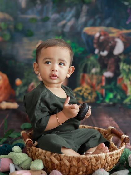A little adventurer in a jungle theme. Themed photoshoots for toddlers are so much fun and let their imagination run wild.
