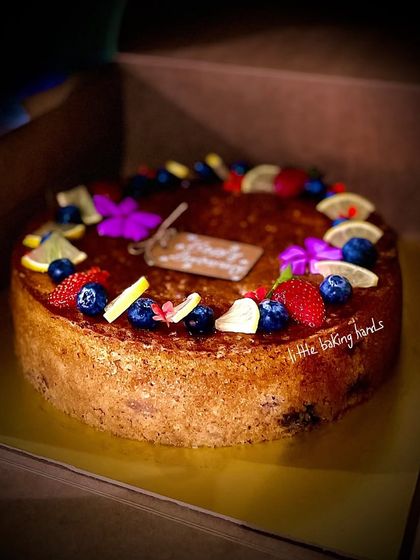 A tangy lime cake with mixed berries, including strawberries and blueberries. This was for a wedding anniversary, and I heard the guests loved the fresh flavour.