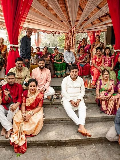 A full family portrait taken on the steps of the mandap. A wonderful memory of all the people who came to celebrate the couple's union.