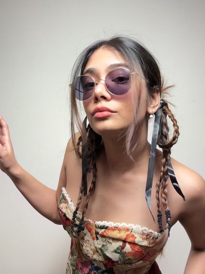 A different vibe with a change of hair and angle. The versatility of a statement top like this corset is what makes it a wardrobe favorite.