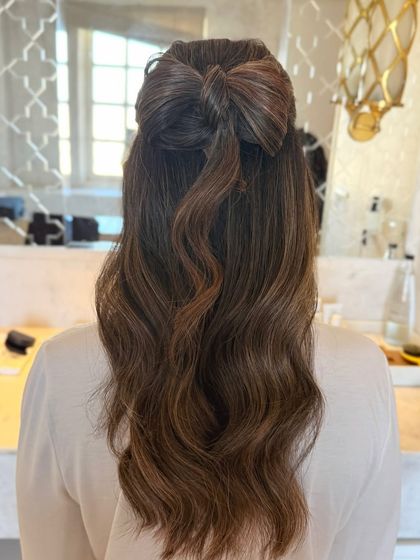 Another view of the hair bow, showing its perfect shape and the soft waves below.
