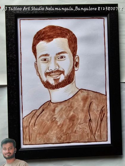 A simple yet compelling solo portrait of a man. The clean lines and shading demonstrate the artistic quality of the blood painting, presented in a classic black frame.