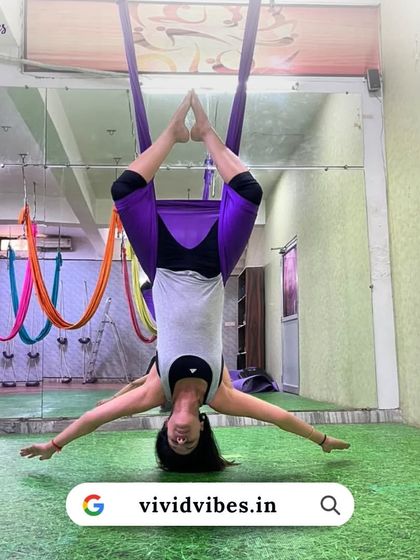Take your practice to new heights. This inverted pose with legs in a diamond shape is excellent for opening the hips and releasing tension in the lower back.