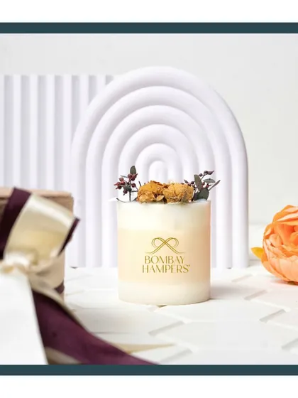 Introducing my own line of branded candles. This one is topped with dried botanicals, offering a scent experience that transports you to another place.