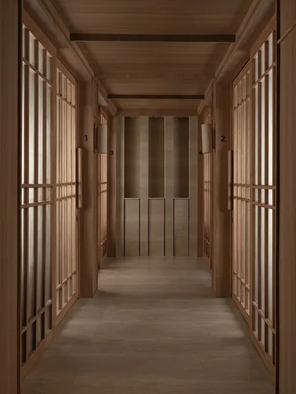 A symmetrical view down a hallway lined with treatment rooms, creating a sense of infinite calm and order.
