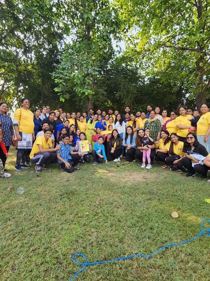 Our annual yogic picnic is a day of fun, food, and community bonding outside the studio. This group photo captures the happy and relaxed atmosphere of our get-together.