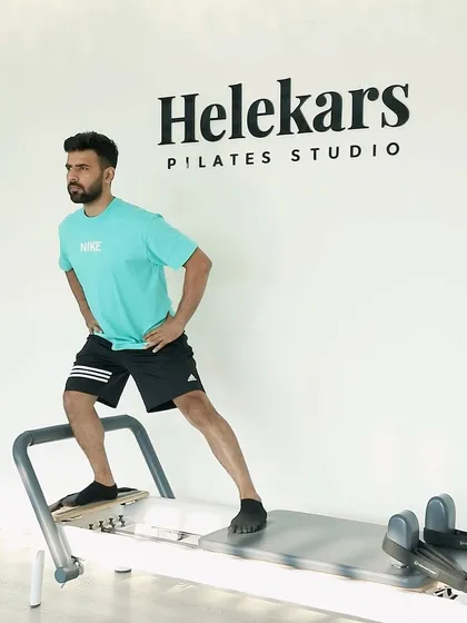 Is Pilates good for men? Absolutely. It builds functional strength, improves flexibility, and enhances athletic performance, as demonstrated by our coach here.