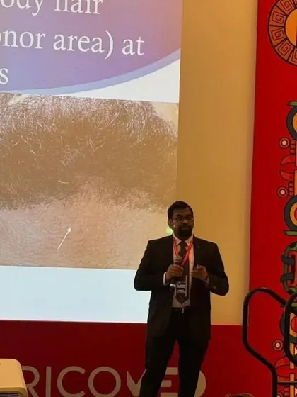 Showing a slide with clinical evidence on the regrowth from body hair donor sites at 6 months post-op.