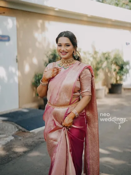 Isha looking graceful and elegant. The makeup is understated, allowing her natural beauty and the stunning saree to take center stage.