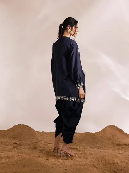 The back of the navy Orion Kaftan Set, showcasing its simple yet elegant silhouette.