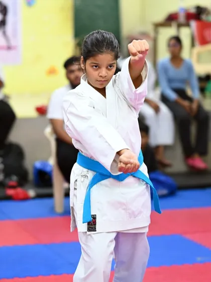 Executing a perfect block. This student shows the precision and power we teach in our Shito Ryu karate classes, preparing her for both kata and kumite.