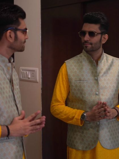 The stage before the stage. A moment of self-reflection and final checks in the mirror before heading out to host.