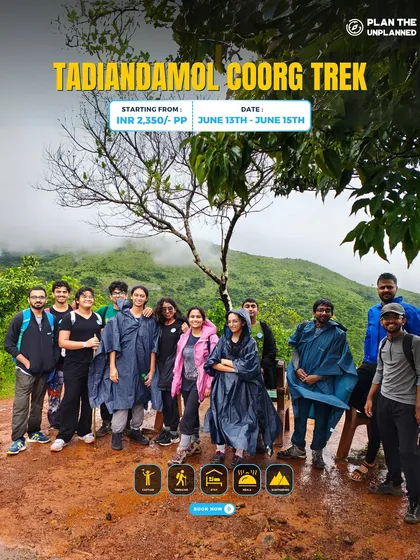 A group in raincoats on the Tadiandamol Coorg trek.