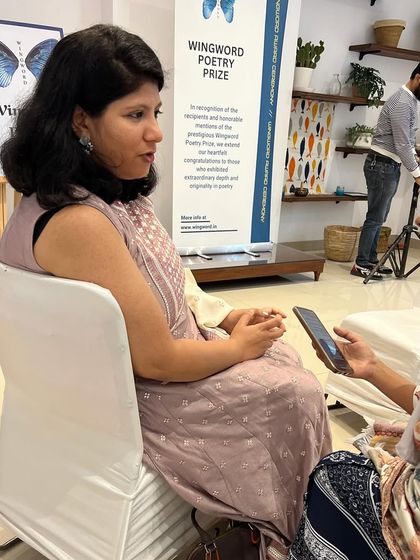 First prize winner Surabhi Naik being interviewed after the ceremony.