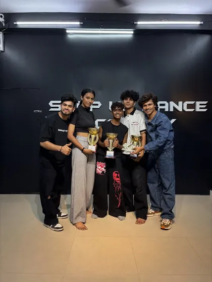 Trophies are just the beginning. Celebrating the winners of our internal academy competition. We believe in creating a competitive environment right here in the studio to prepare you for the pressure of the main stage.