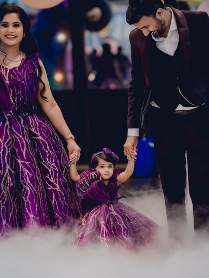 A magical family entrance through a cloud of fog at the Candyland party.