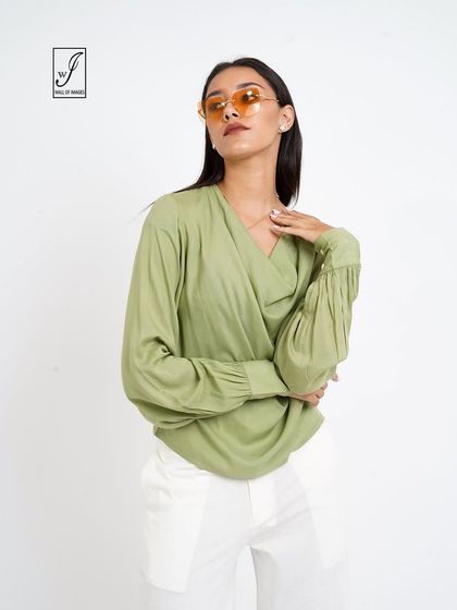 A variation of the pose, showing the wrap detail of the top.