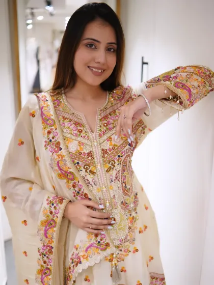 Grace in every stitch, simplicity with a touch of royalty. This cream embroidered suit is timeless.