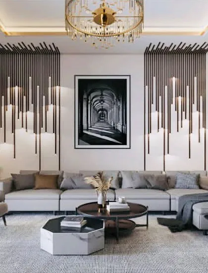 We love making a statement with bold design choices. This living room features dramatic wall accents, a stunning modern chandelier, and a custom coffee bar, all coming together to create a space that is both unique and deeply luxurious.