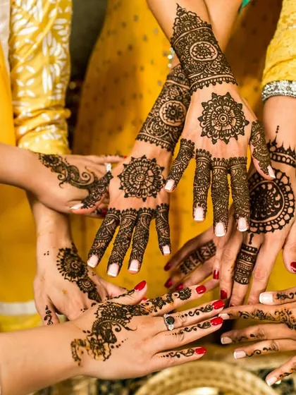 The beauty of Mehndi is in the details. We take artistic shots that focus on the intricate henna designs, celebrating this important tradition with close-up photography that highlights the artistry and the gathering of friends.