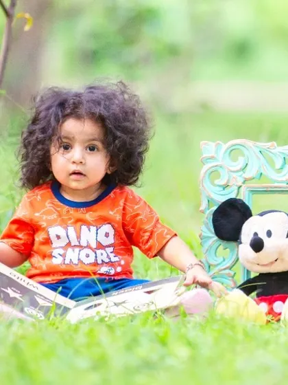 Reading with a friend. Combining beloved characters with activities like reading makes the session feel like playtime for the child.