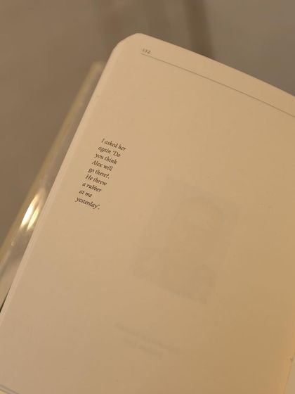 Another page from the book, featuring sparse, poetic text that invites the reader to pause and reflect.