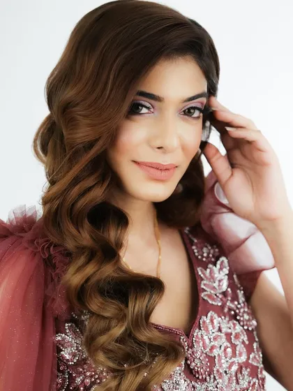 This smiling portrait shows the fresh and youthful vibe of this makeup look.