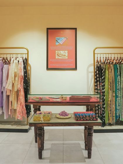 A close-up of the display area, where the warm lighting and wooden furniture create an inviting atmosphere for shoppers.