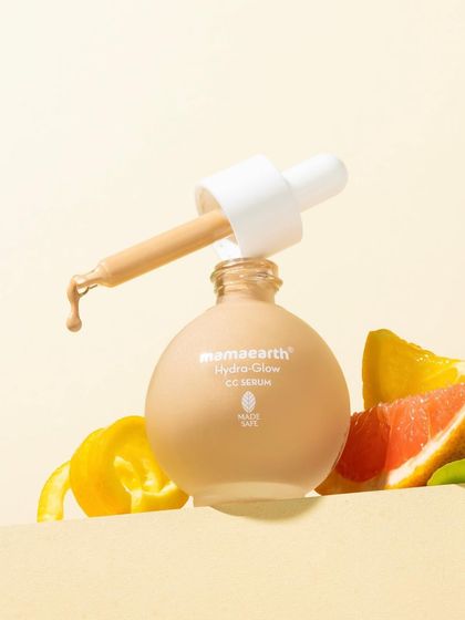 A slightly different angle of our ingredient-focused serum shot. This composition balances the product with fresh grapefruit and lemon peels, creating a beautiful still life that feels both natural and luxurious.