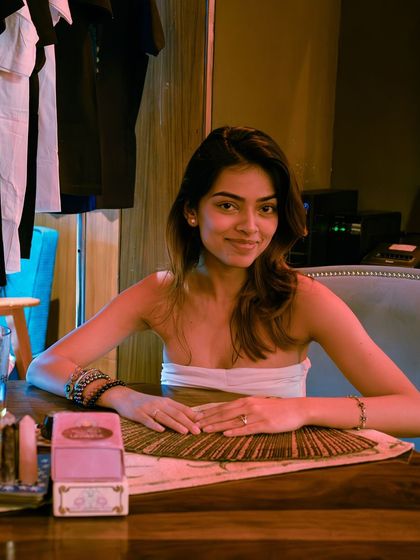 A simple, candid photo of me, embodying the calm and centered energy I cultivate in my practice.