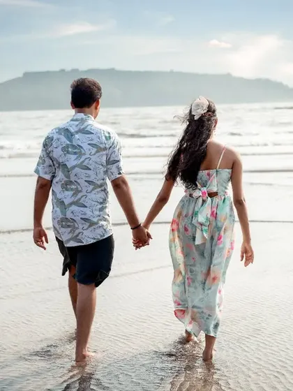 A simple walk on the beach, hand in hand. I love capturing these casual, candid moments that show a couple's natural connection during their Alibag pre-wedding session.