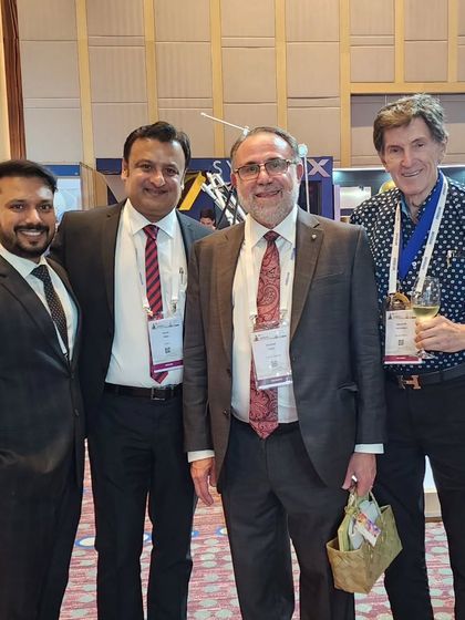 Networking with leading figures in dermatology at the 11th DASIL World Congress, including Dr. Des Fernandes, Dr. Michael Gold, and Dr. Rahul Pillai.