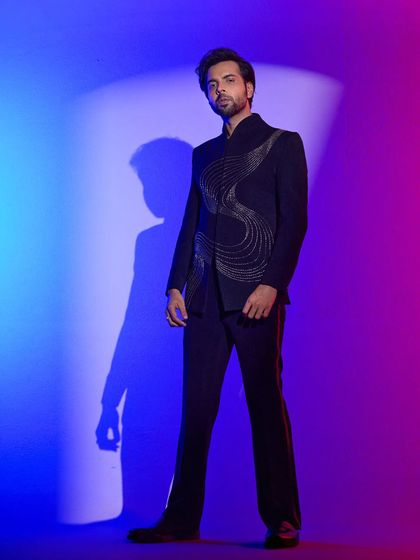 Actor Abhishek Kumar wearing a custom Master Bespoke bandhgala with our signature 'Illusion' embroidery for the IIFA Awards. A proud moment seeing my design on the green carpet.