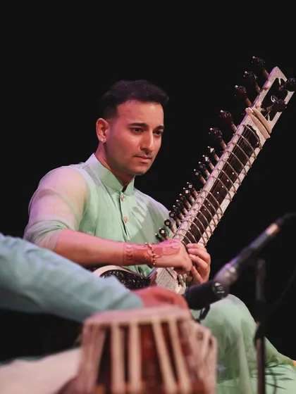 A close-up of me and my tabla player during the London show, capturing our intense focus and connection.