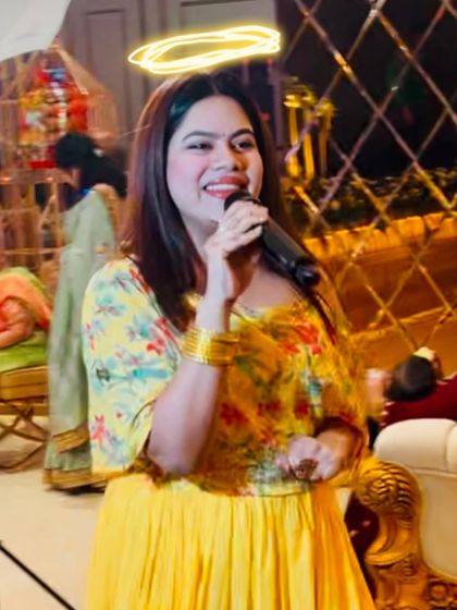 A cute moment during the engagement ceremony. The halo effect is exactly how the couple should feel, like angels.