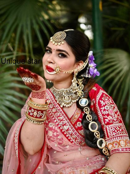 A candid moment captured during a photoshoot, with the model blowing a kiss. It shows the fun and confidence our outfits can bring.