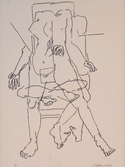 An ink drawing by Shamshad Hussain, showing his mastery of line work. The piece features overlapping nude figures on a chair, showcasing his distinct approach to the human form.