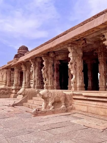 The beautiful stone pillars of a temple mandapa in Hampi, showcasing the incredible craftsmanship of the era.