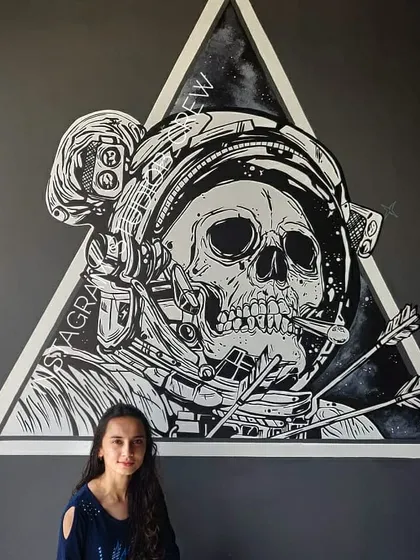 This black and white astronaut skull was a super fun piece for the Lounge29 pub in Mysore. It's a high-impact, edgy design that gives the space a unique, graphic novel feel.